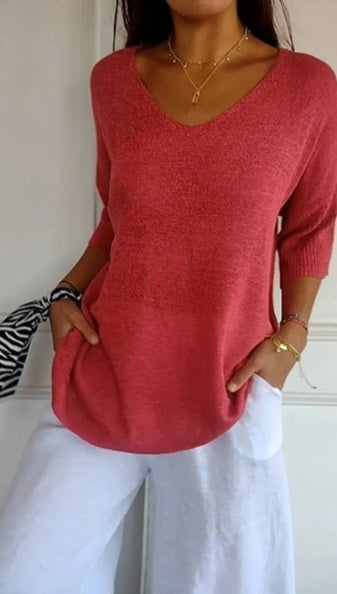 Effen gebreide damesblouse met 3/4 mouwen en V-hals