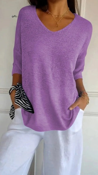 Effen gebreide damesblouse met 3/4 mouwen en V-hals