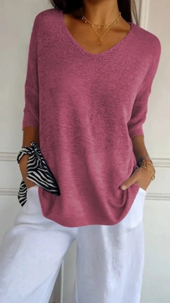 Effen gebreide damesblouse met 3/4 mouwen en V-hals