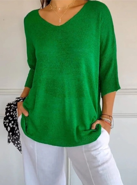 Effen gebreide damesblouse met 3/4 mouwen en V-hals