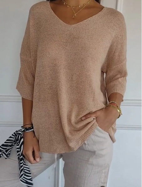 Effen gebreide damesblouse met 3/4 mouwen en V-hals