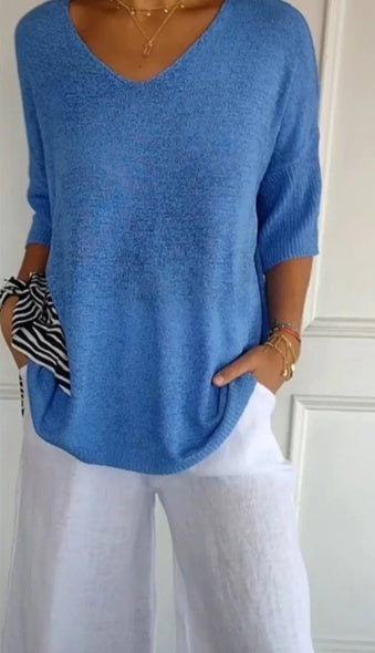 Effen gebreide damesblouse met 3/4 mouwen en V-hals